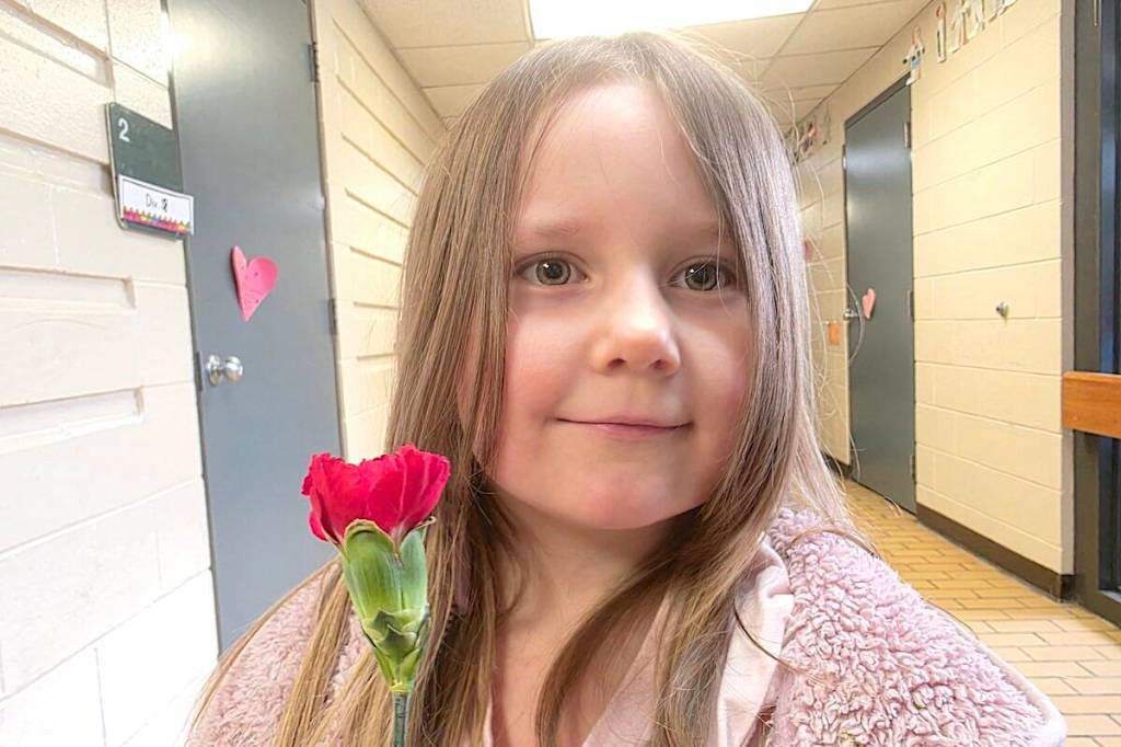 Some students at Douglas Park Community School marked Pink Shirt Day by handing out &lsquo;kindness flowers.&rsquo; (Dan Ferguson/Langley Advance Times)