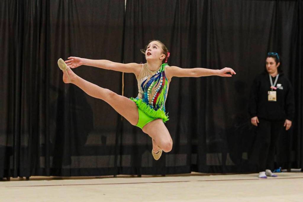 Rhythmic Gymnastics is described as the ultimate test of flexibility, coordination and artistry. It combines elements of dance and gymnastics in choreographed routines featuring an apparatus like ribbon, ball, and hoop. (Photos/Jen Small/Special to Trail Times)